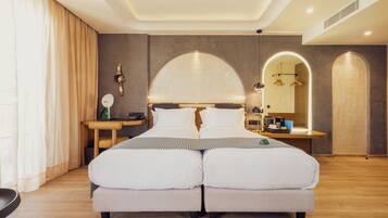 Ropa de cama de alta calidad y minibar