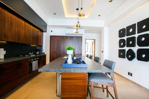 Kitchen is also  equipped with a microwave and top-of-the-line appliances - 6th-Floor Amapas Retreat – Pool & Sunset Views (Puerto Vallarta)