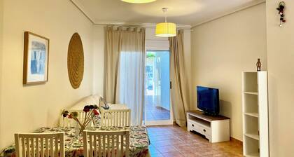 Apartamento en planta baja con terraza con salida directa a la piscina