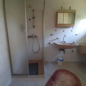 Dutxa i assecador de cabells