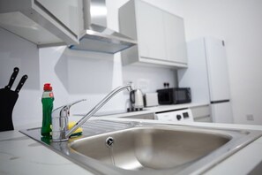 Frigorifero, microonde, forno, macchina per tè/caffè