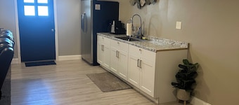 20 mins from the SLC airport spacious, clean, and cozy listing.