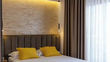 Deluxe Double Room (2 adults +1 child) | Soundproofing, free WiFi