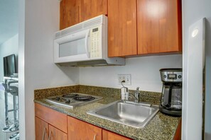 Fridge, microwave, stovetop, coffee/tea maker