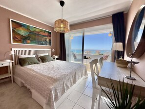 2 bedrooms, desk, iron/ironing board, travel crib