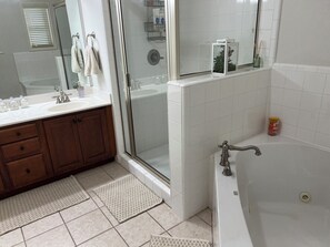 Jetted tub, hair dryer, towels, soap