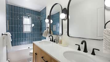Hair dryer, towels, soap, shampoo
