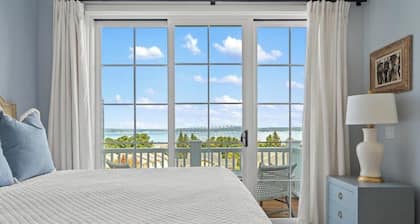 Welcoming! Professionally Decorated with Panoramic Lake Views. One of a Kind!