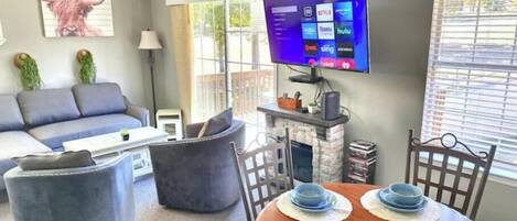 Smart TV, fireplace, books