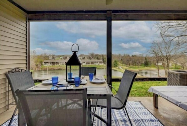 Outdoor dining - Gorgeous Golf Views, two porches, 3 pools, 1 heated, Hot Tub, Resort! (Branson)