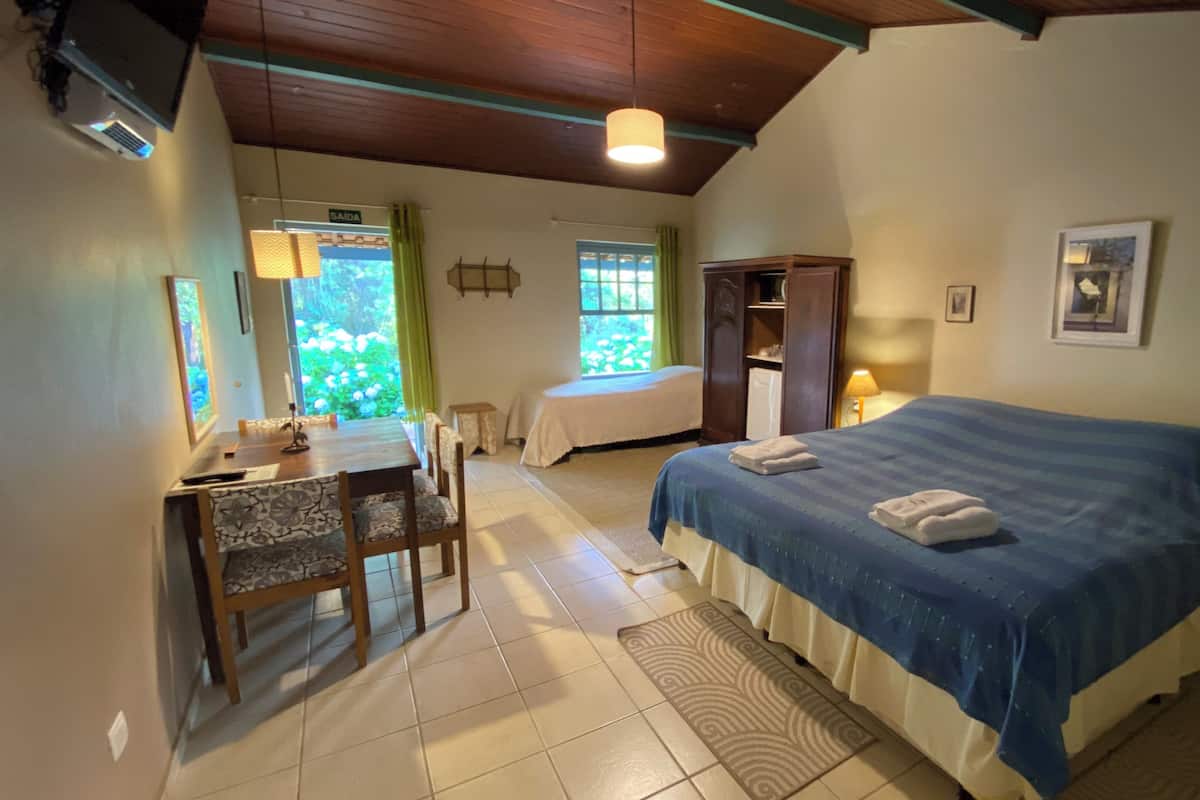 Family Suite, Multiple Beds, Balcony, Garden View | 1 bedroom, individually decorated, individually furnished, free WiFi