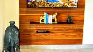 55-inch Smart TV with digital channels, books - The Forest Suites at Anse Marcel | Boutique Hotel & Restaurant (Anse Marcel)