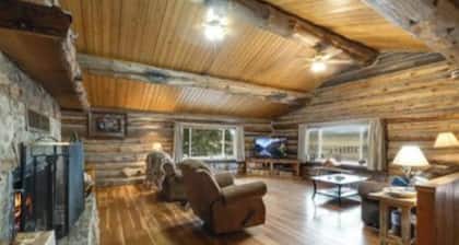 5 bedroom custom Lodge, log home. rec room, on river, fishing, open kitchen