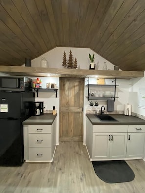 Fridge, microwave, stovetop, coffee/tea maker