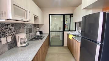 Basic Apartment, 2 Bedrooms, Kitchen, Tower | Private kitchen | Fridge, microwave, dishwasher, toaster