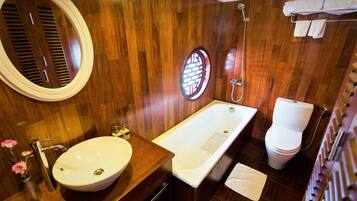 Suite with Terrace and Bathtub | Bathroom | Hydromassage showerhead, designer toiletries, hair dryer, slippers