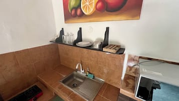 Microwave, stovetop, cookware/dishes/utensils
