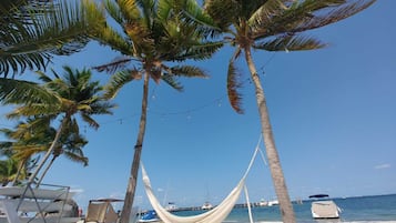 On the beach, sun loungers