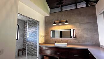 Shower, jetted tub, towels, soap