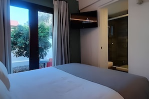 Apartamento básico | Ferros/tábuas de passar roupa, Wi-Fi de cortesia