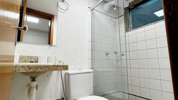 Shower, rainfall showerhead, hair dryer, towels