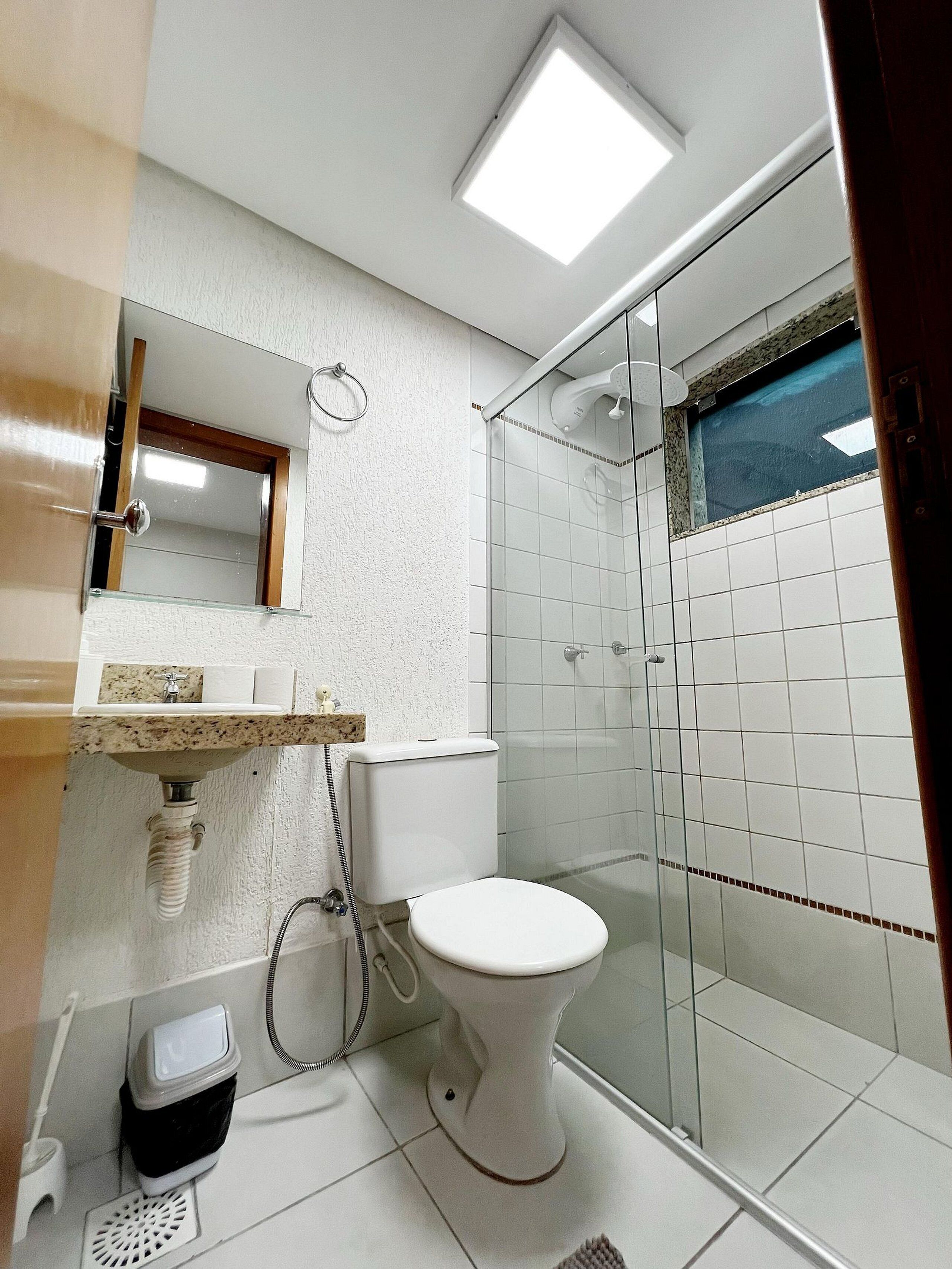 Shower, rainfall showerhead, hair dryer, towels