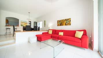 Family Villa, Garden View | Living area | 40-inch flat-screen TV with digital channels