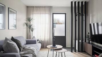 Apartemen Superior, 3 kamar tidur, dapur, pemandangan halaman | Area keluarga | TV dan mainan