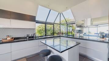 Fridge, coffee/tea maker, cookware/dishes/utensils