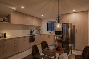 Coffee/tea maker, fridge, microwave, oven