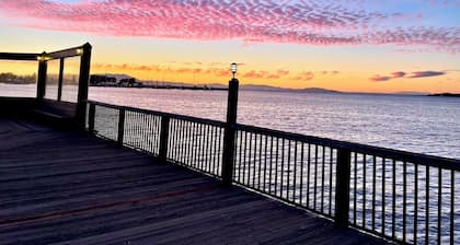Pet-friendly 2 bdrm condo with waterviews, near shops & transp., w/pool & gym