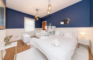 1 slaapkamer, een strijkplank/strijkijzer, reisbedje, gratis wifi