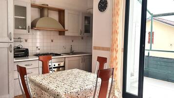 Fridge, oven, dining tables