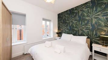 1 habitación, tabla de planchar con plancha, wifi gratis y ropa de cama