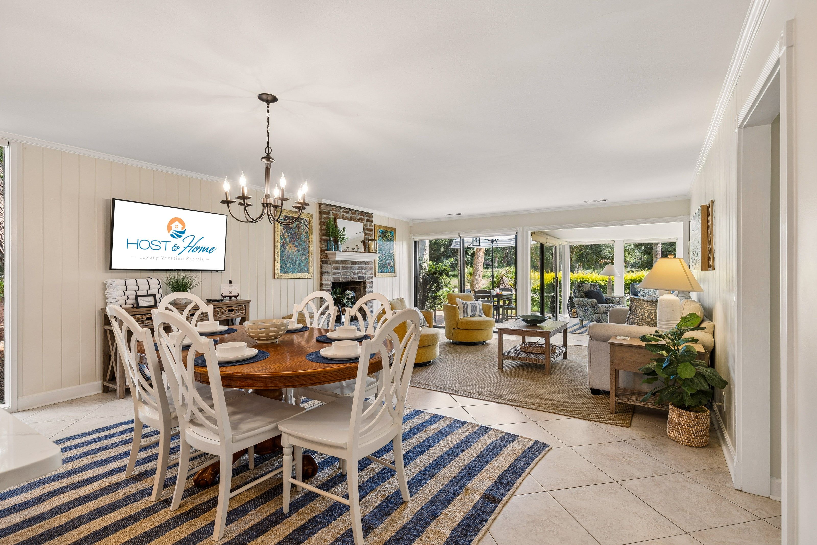 The open floor plan connects the living room, dining area, and kitchen, creating an inviting environment