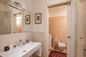 Ducha, secador de pelo