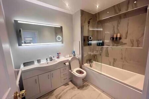 Hair dryer, towels, soap, toilet paper