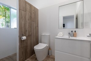 Eco-friendly toiletries, hair dryer, towels