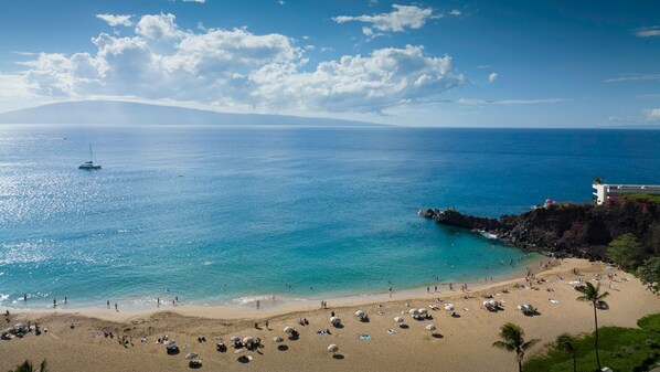 Relax on the beach with stunning ocean views and access to water activities.