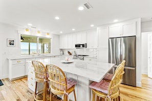 Fridge, microwave, oven, stovetop - 1733 E Ashley Ave - Beach Haven - Ocean Views Remodeled Near Lighthouse Nature Preserve (Folly Beach)
