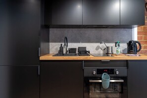 Réfrigérateur, four, plaque de cuisson, lave-vaisselle