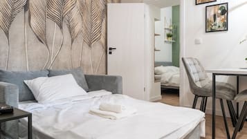 1 habitación, tabla de planchar con plancha, wifi y ropa de cama