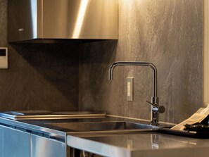 Fridge, microwave, cookware/dishes/utensils