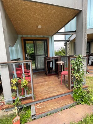 Deluxe Quadruple Room, Patio, Courtyard View | Desk