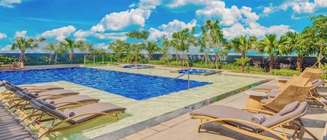 Outdoor pool, pool umbrellas, pool loungers