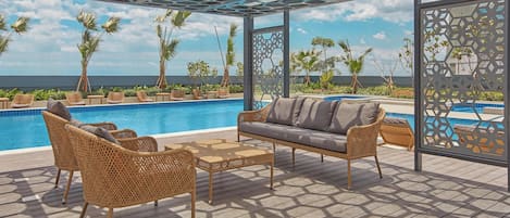 Outdoor pool, pool umbrellas, sun loungers