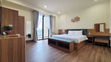 Deluxe dubbelrum - utsikt mot staden | Sängtillbehör av högsta kvalitet, duntäcken och memory foam-madrasser