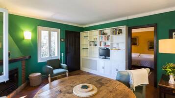 Comfort Apartment, Garden View | Living area | Flat-screen TV