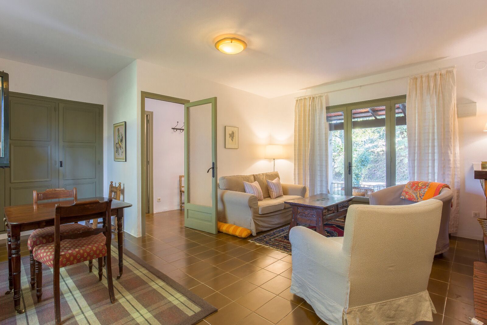 Family Apartment, Garden View | Living area | Flat-screen TV