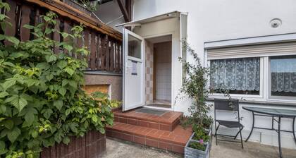 Ferienwohnung 'Ruhiges Nest Mit Sauna Und Garten' mit Gemeinschaftsgarten und WLAN